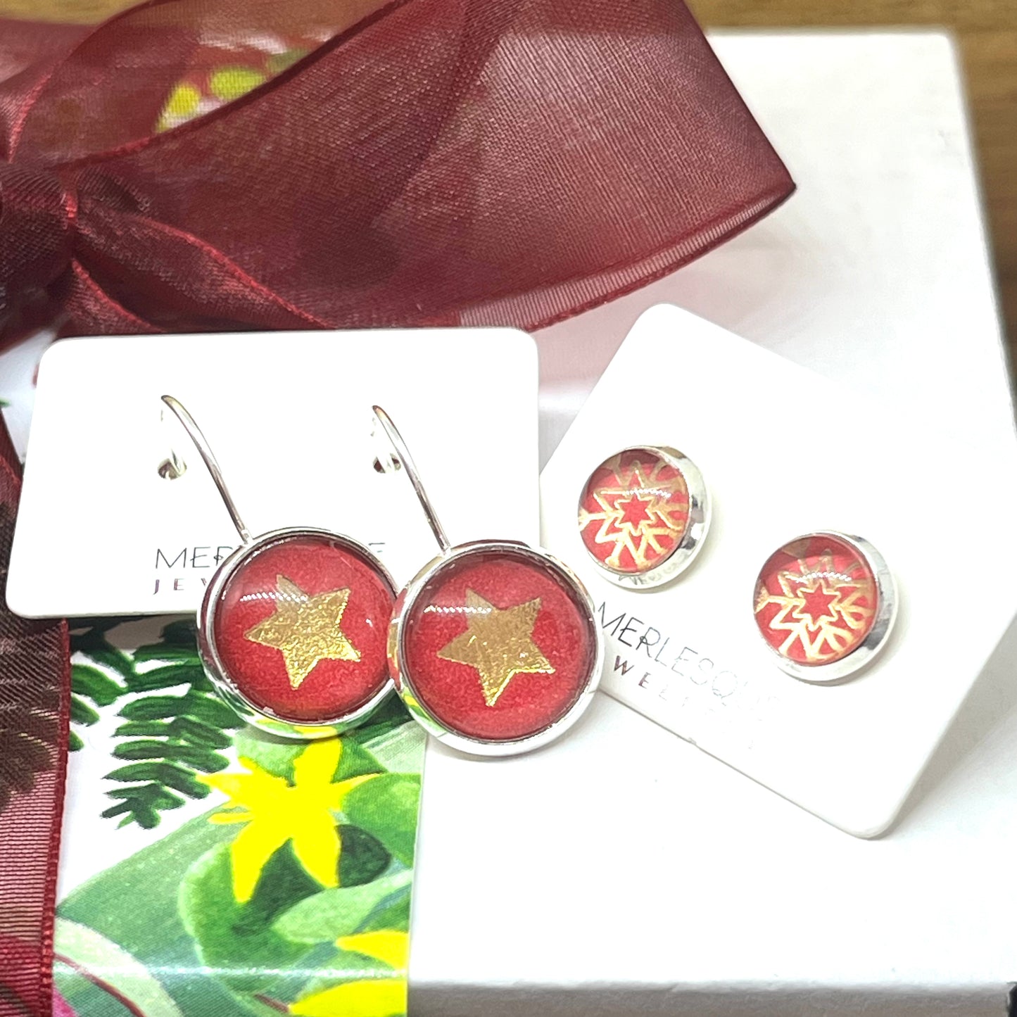 White and rose glass dome snowflake studs with festive star earrings