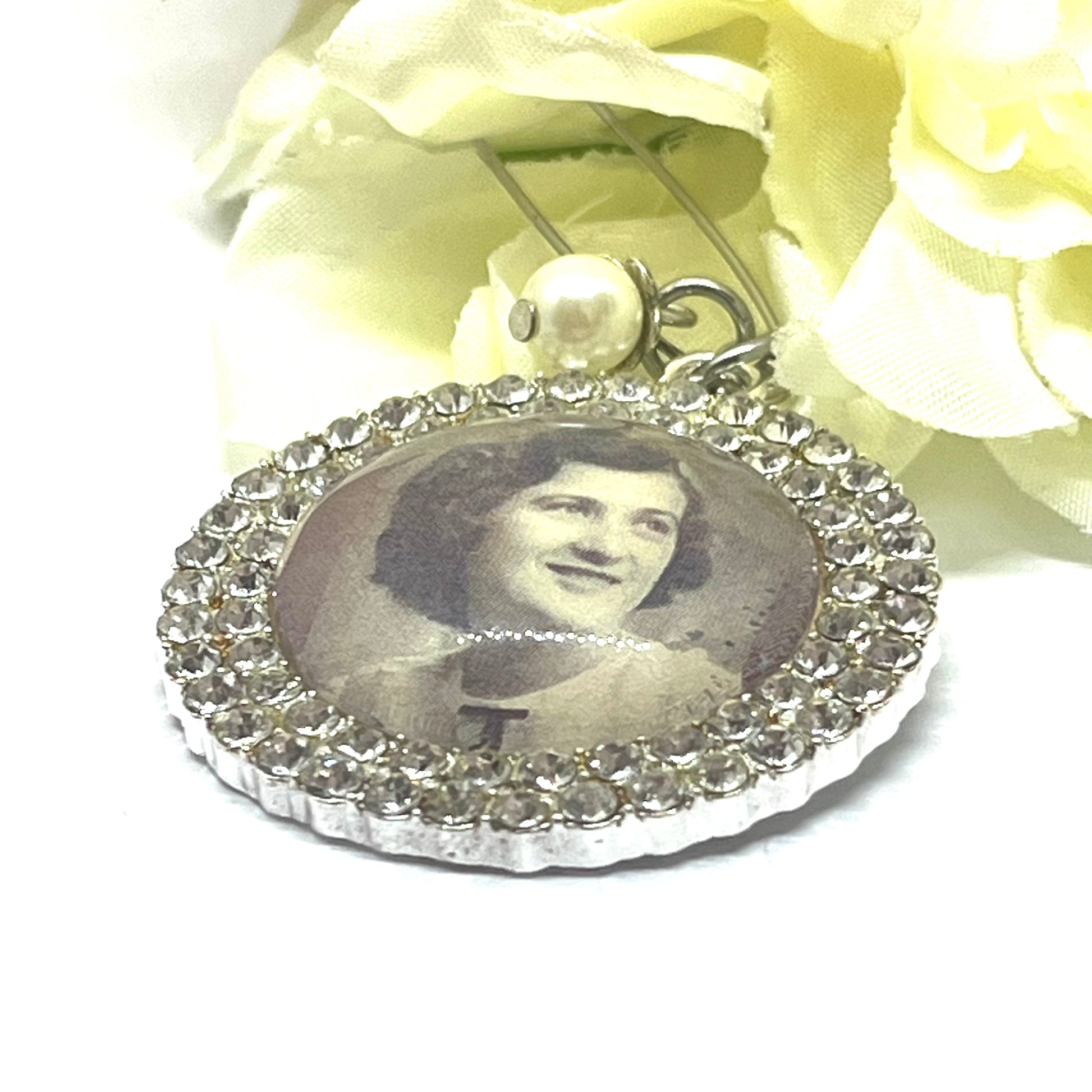 Silver diamond flower charm with a pearl