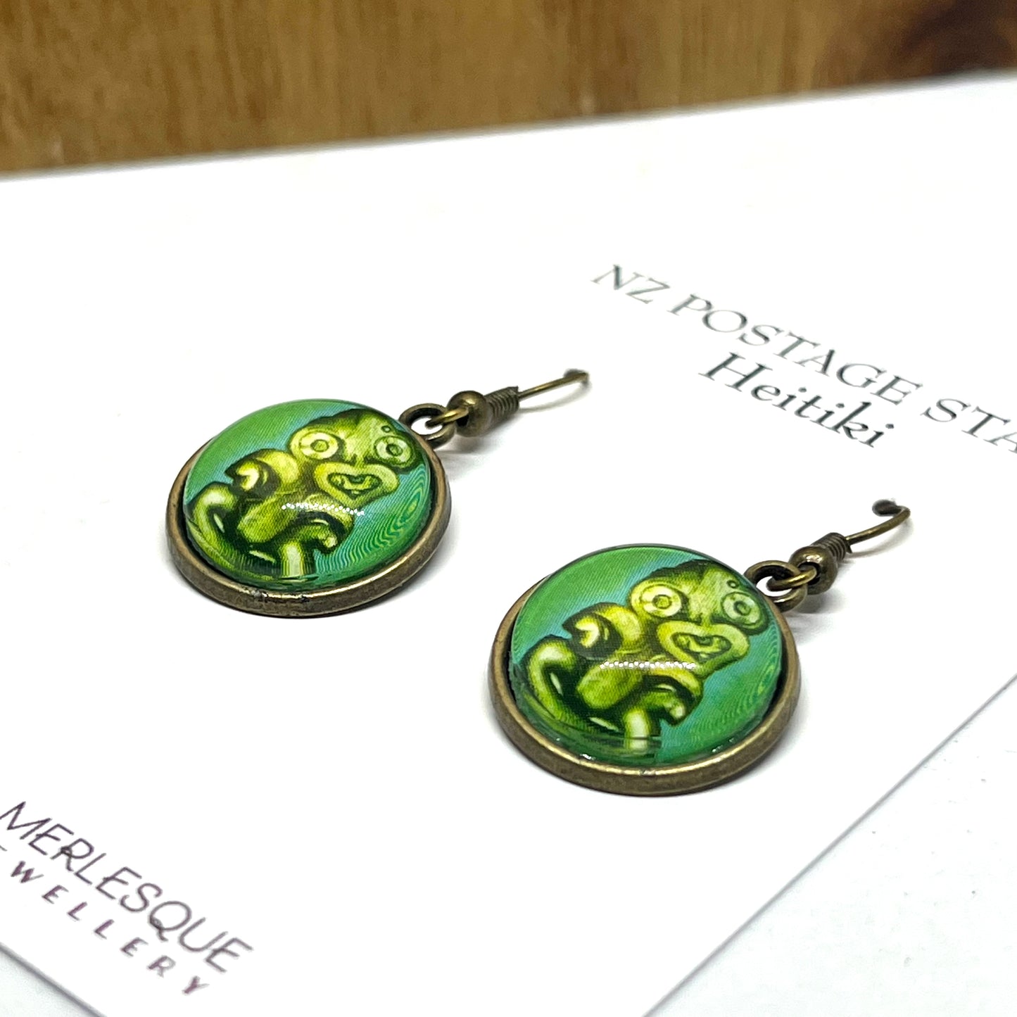 Hei tiki stamp image on short bronze earring hooks
