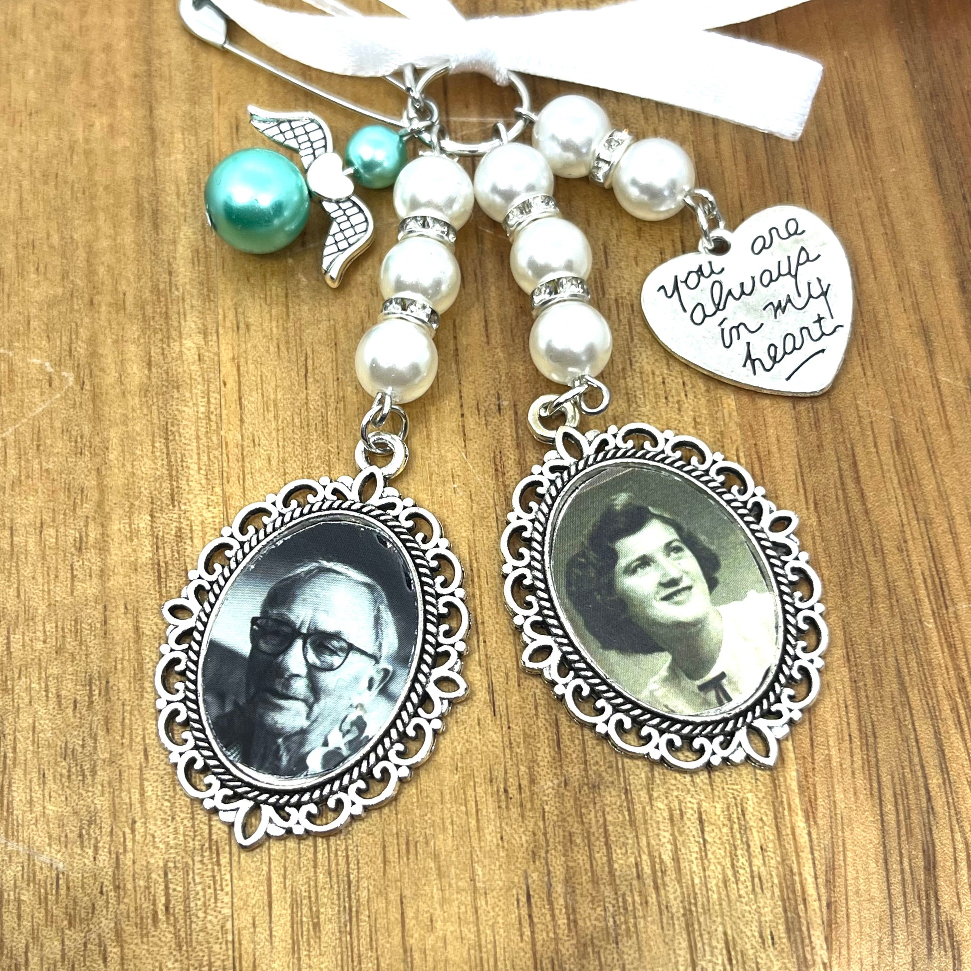silver wedding bouquet charm with pearls, diamantes and an angel on a white ribbon and an always in my heart charm.