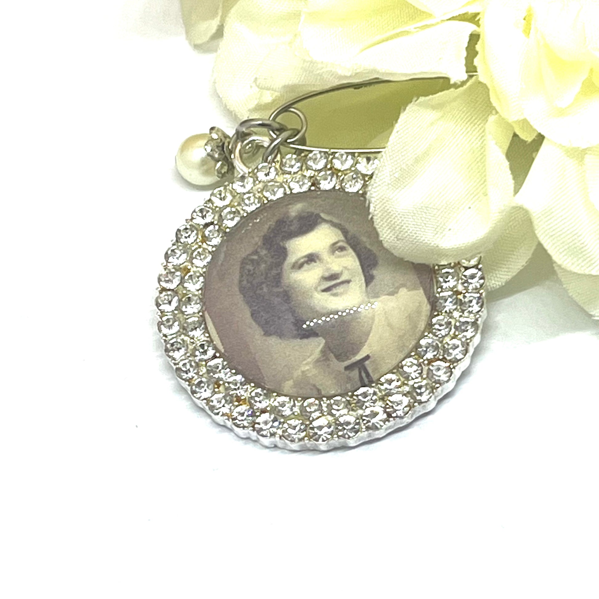 Silver diamond flower charm with a pearl