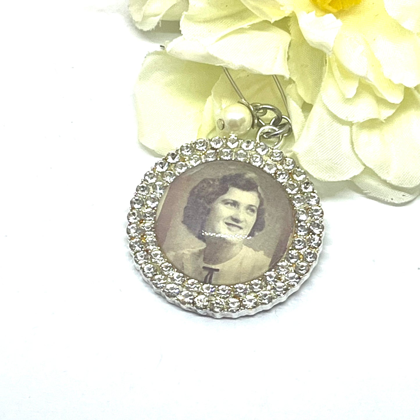 Silver diamond flower charm with a pear