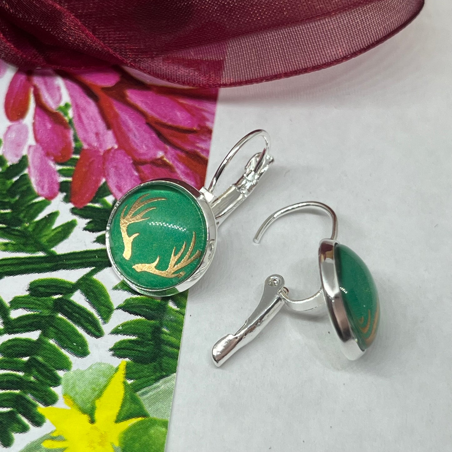 Green and rose gold glass dome reindeer christmas earrings