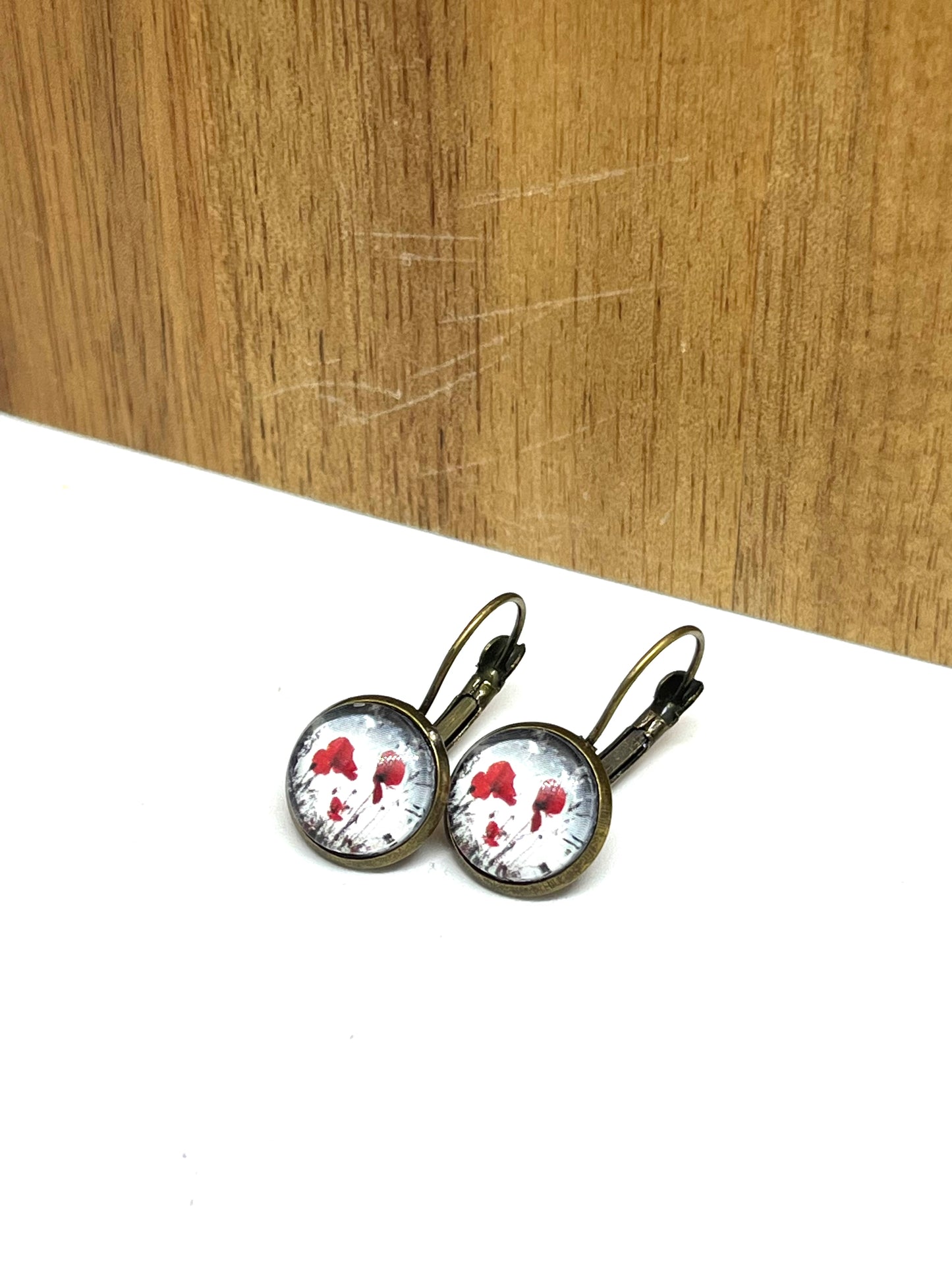 Bronze Poppy glass dome earrings