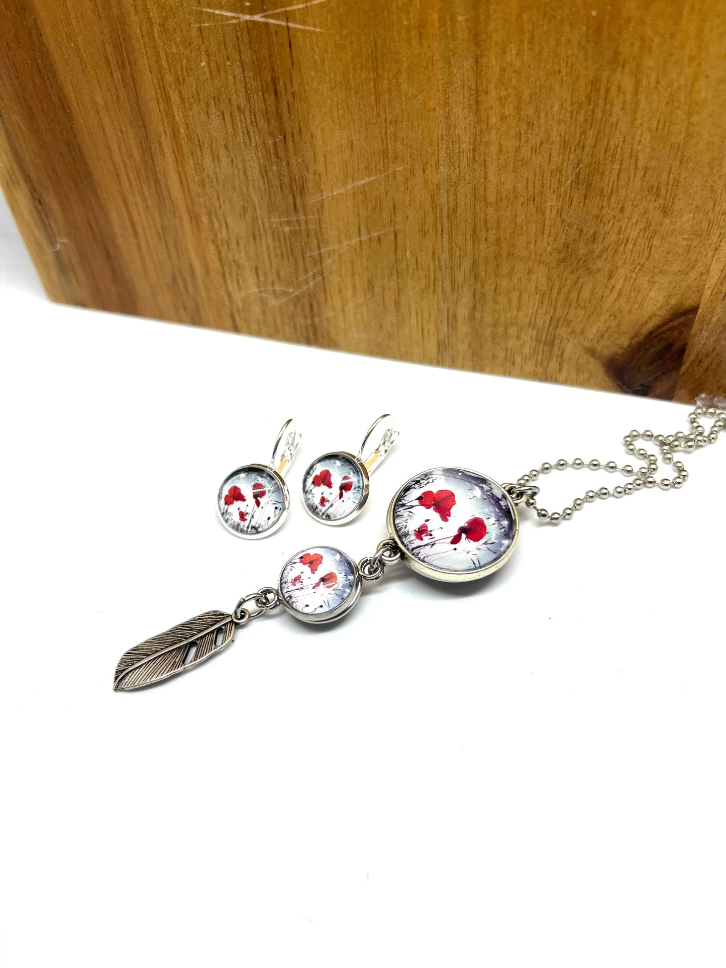 Poppy glass dome earrings with a matching double sided fantail necklace