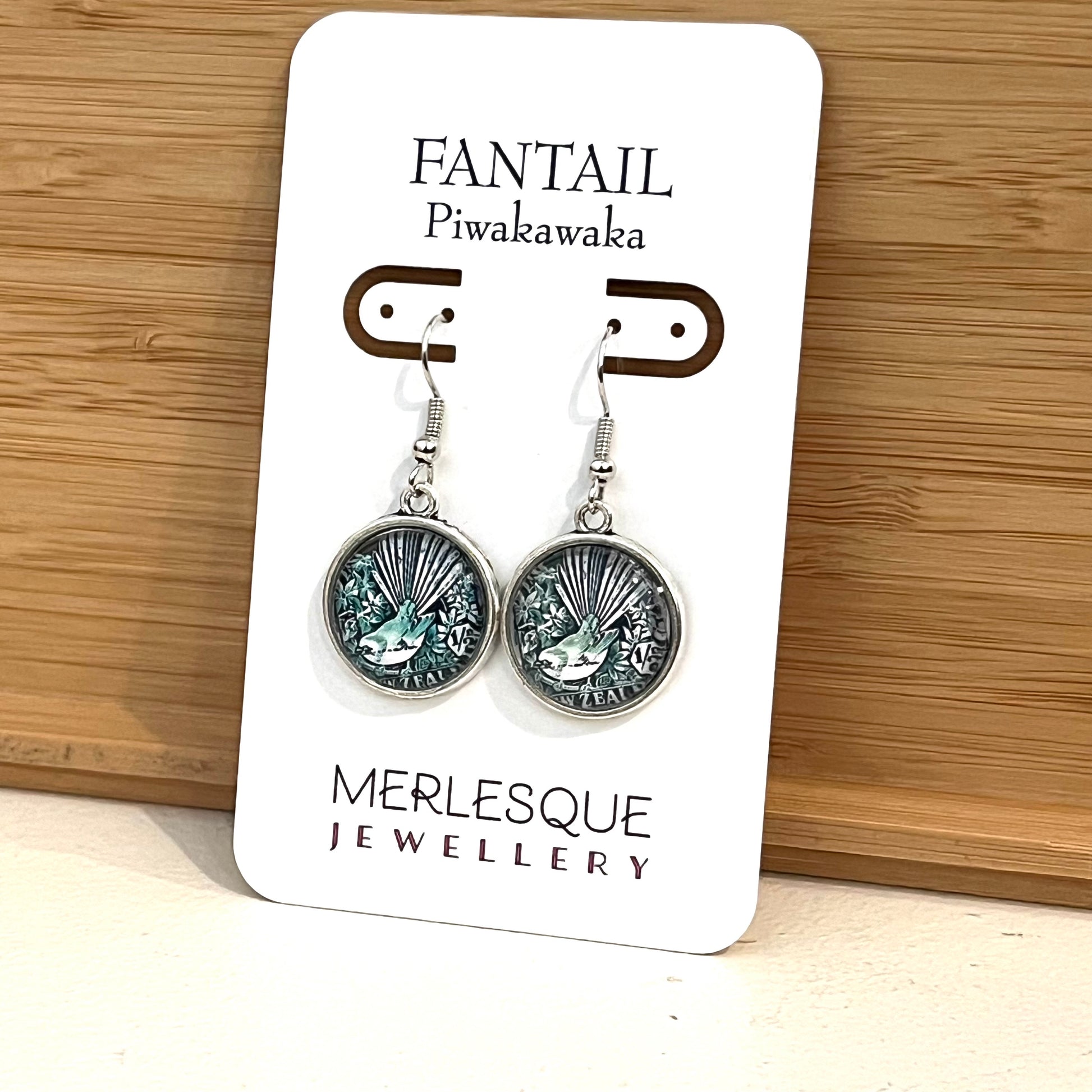 Short hooked green fantail (Piwakawaka) earrings