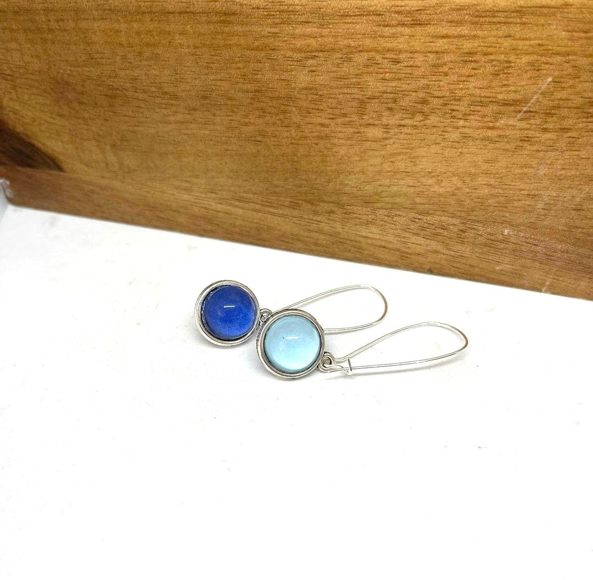 Double sided glass dome earrings with Electric blue on one side and sky blue on the other