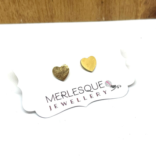Stainless steel gold heart studs.