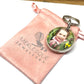 Photo keyring in a silver setting.