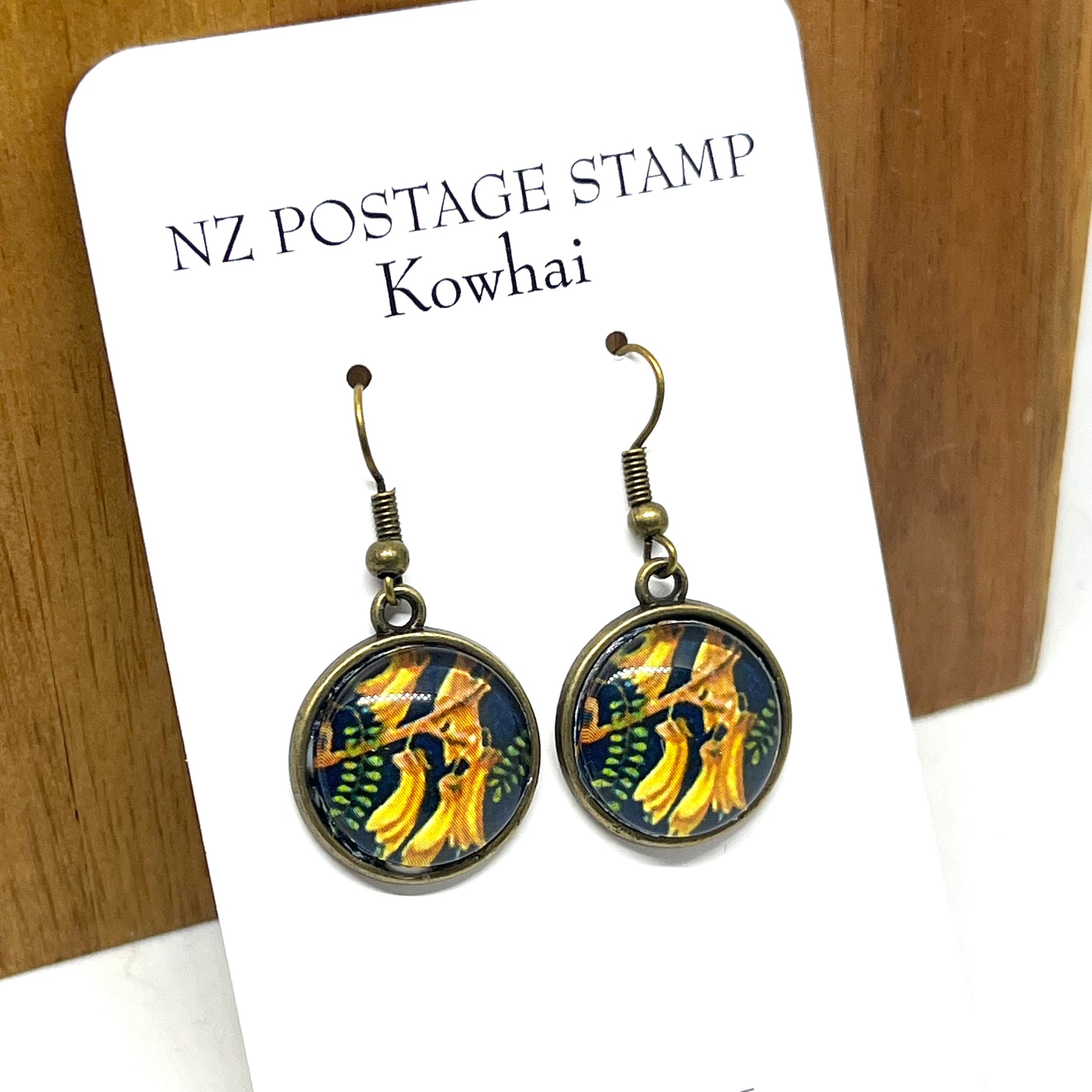 Kowhai stamp image on short bronze earring hooks