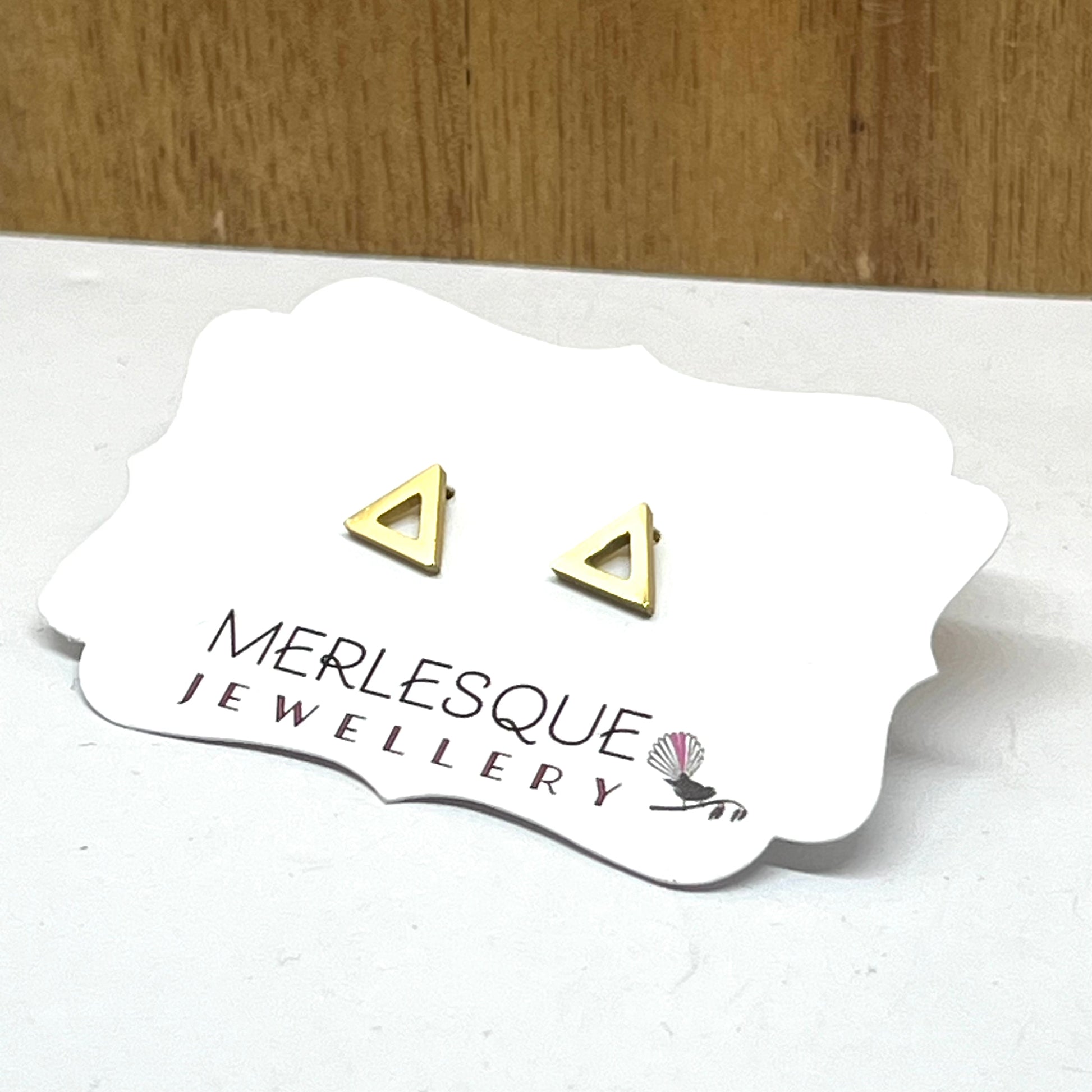 Stainless steel open triangle studs.