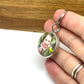 Photo of a little girl in a keyring.