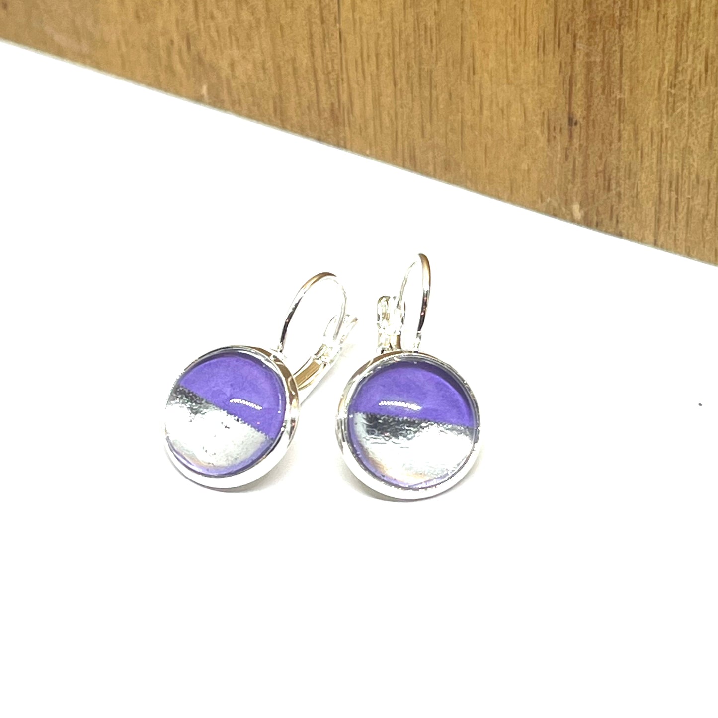 Silver dipped on purple glass dome earrings