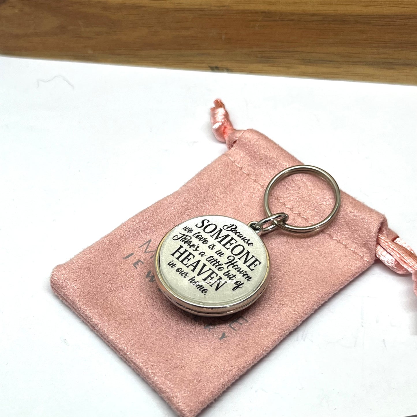 Because someone we love is in heaven There's a little bit of heaven in our home keyring