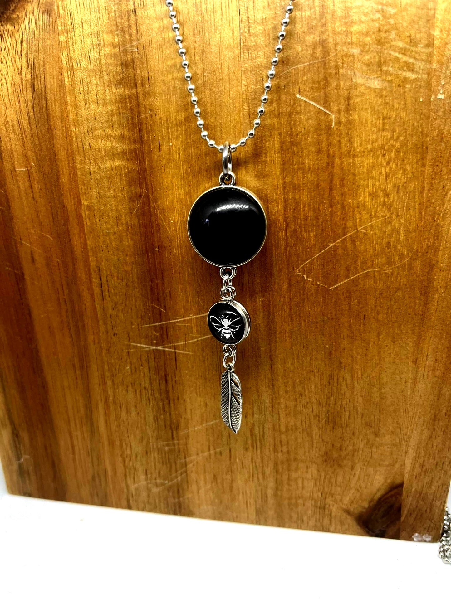 DOUBLE SIDED SILVER BEE + DANDELION NECKLACE