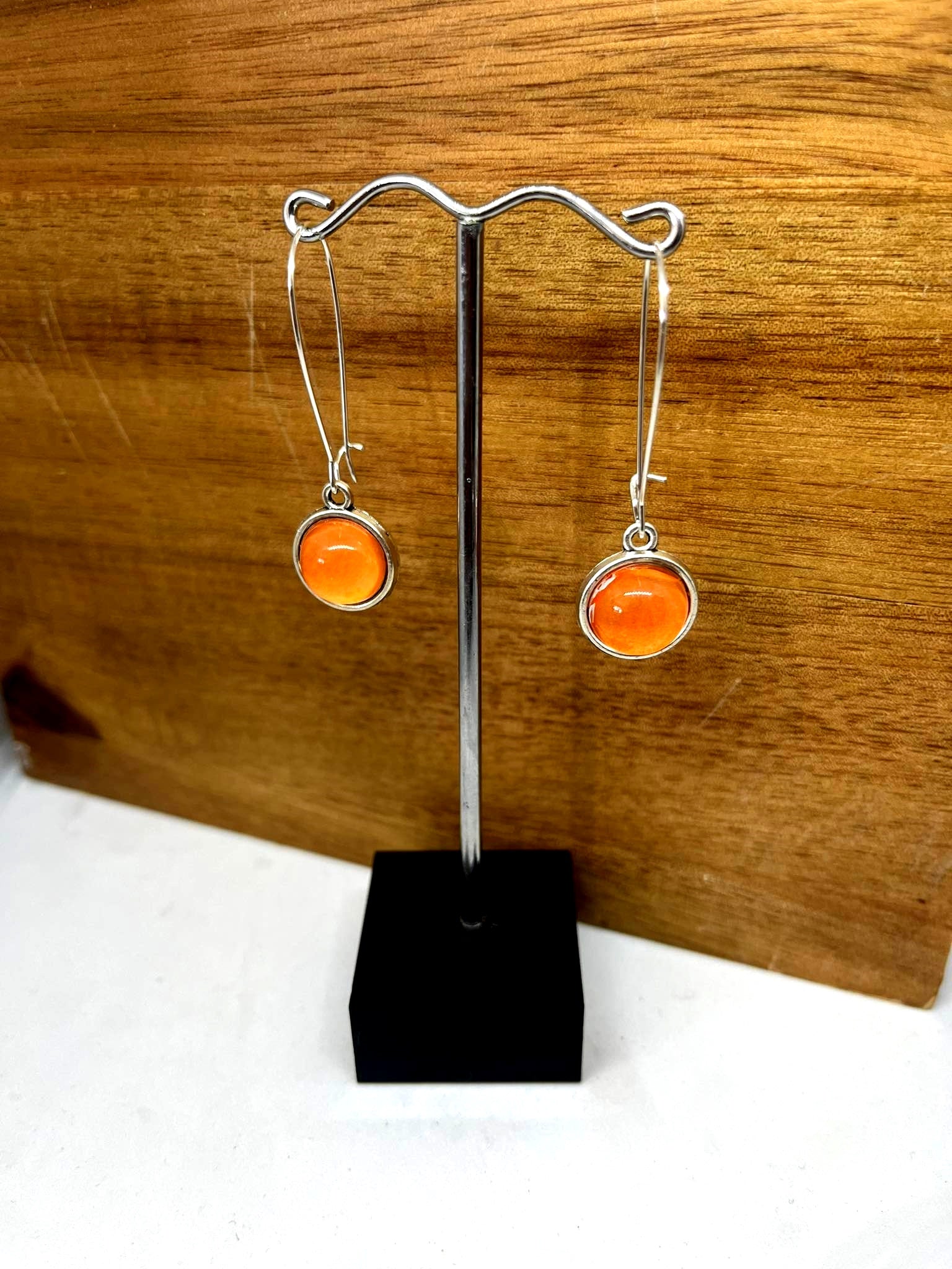Double sided glass dome earrings with  orange balls