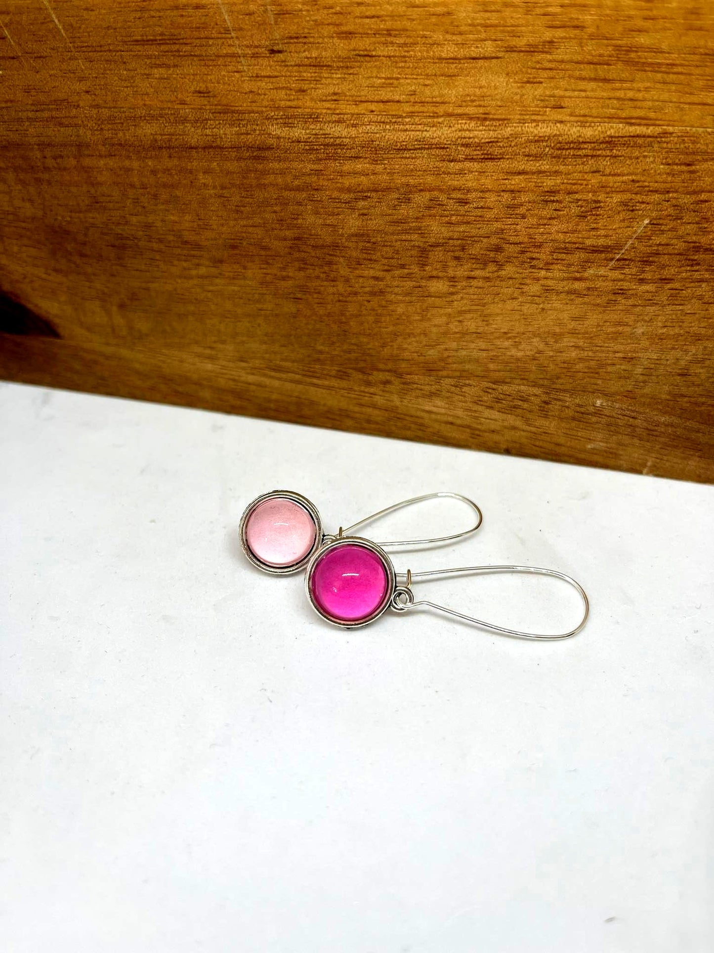 Double sided glass dome earrings with bold pink and pastel other side