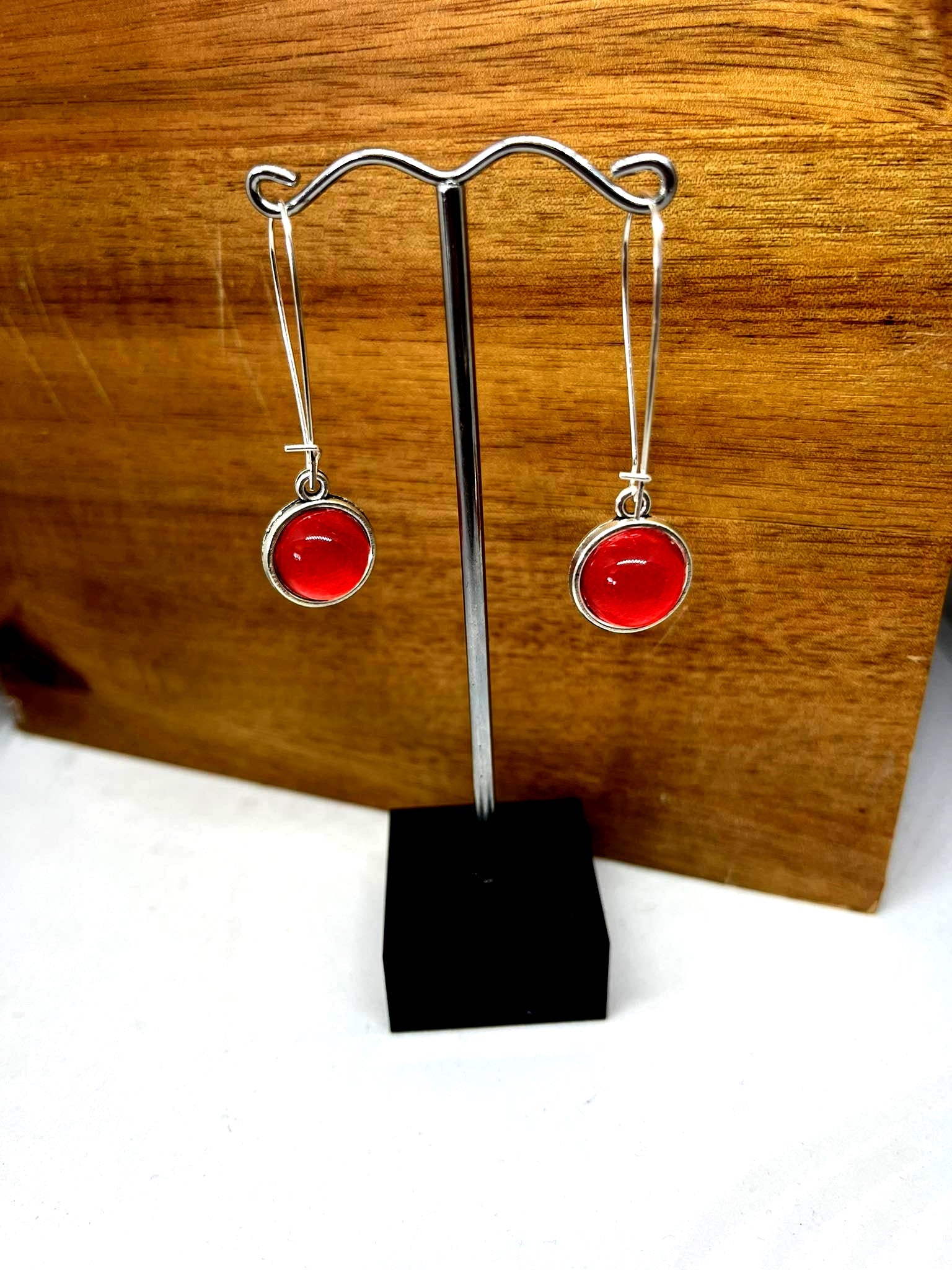 Double sided glass dome earrings with bold red hanging balls