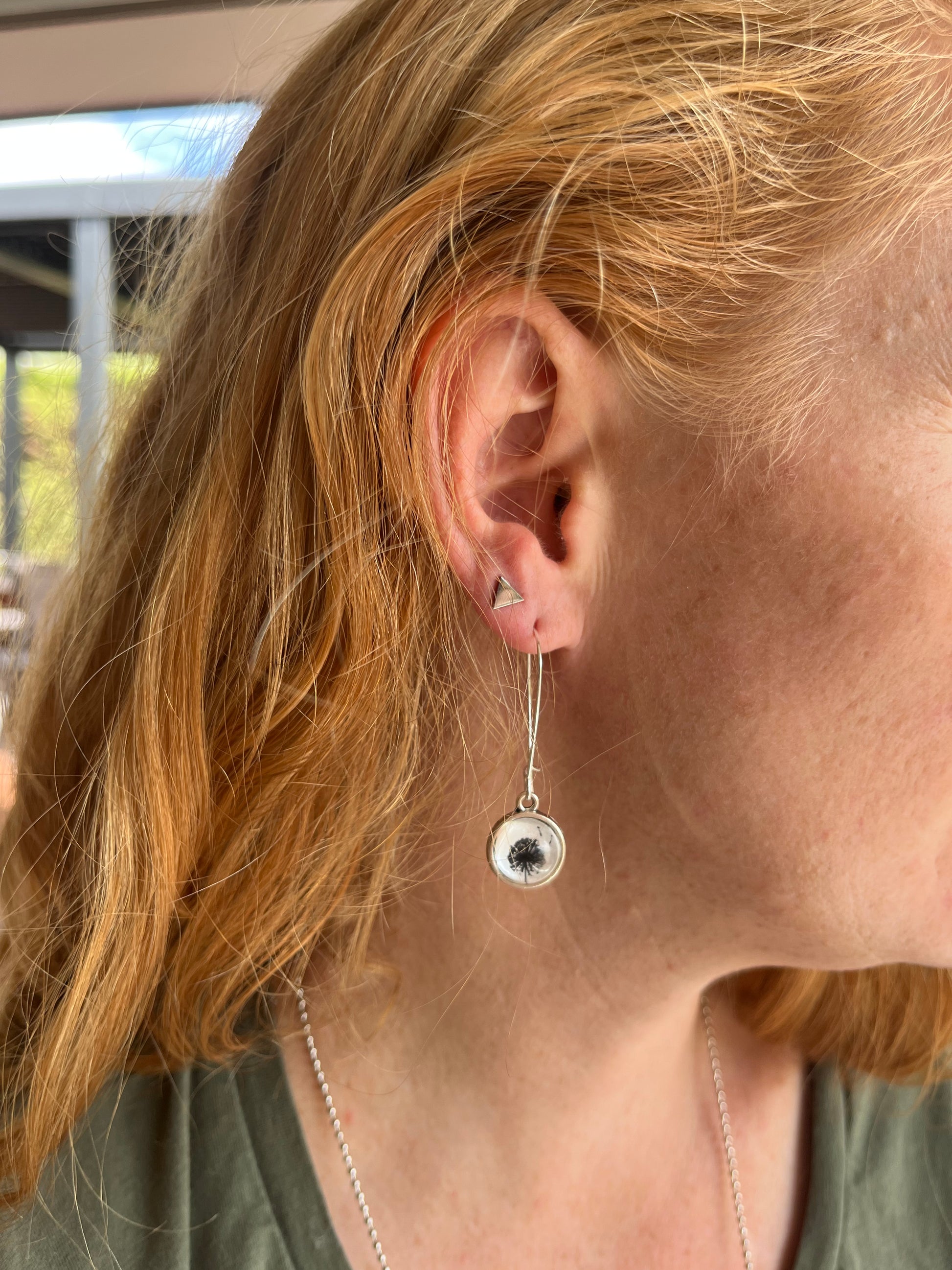 Double sided glass dome earrings with a dandelion
