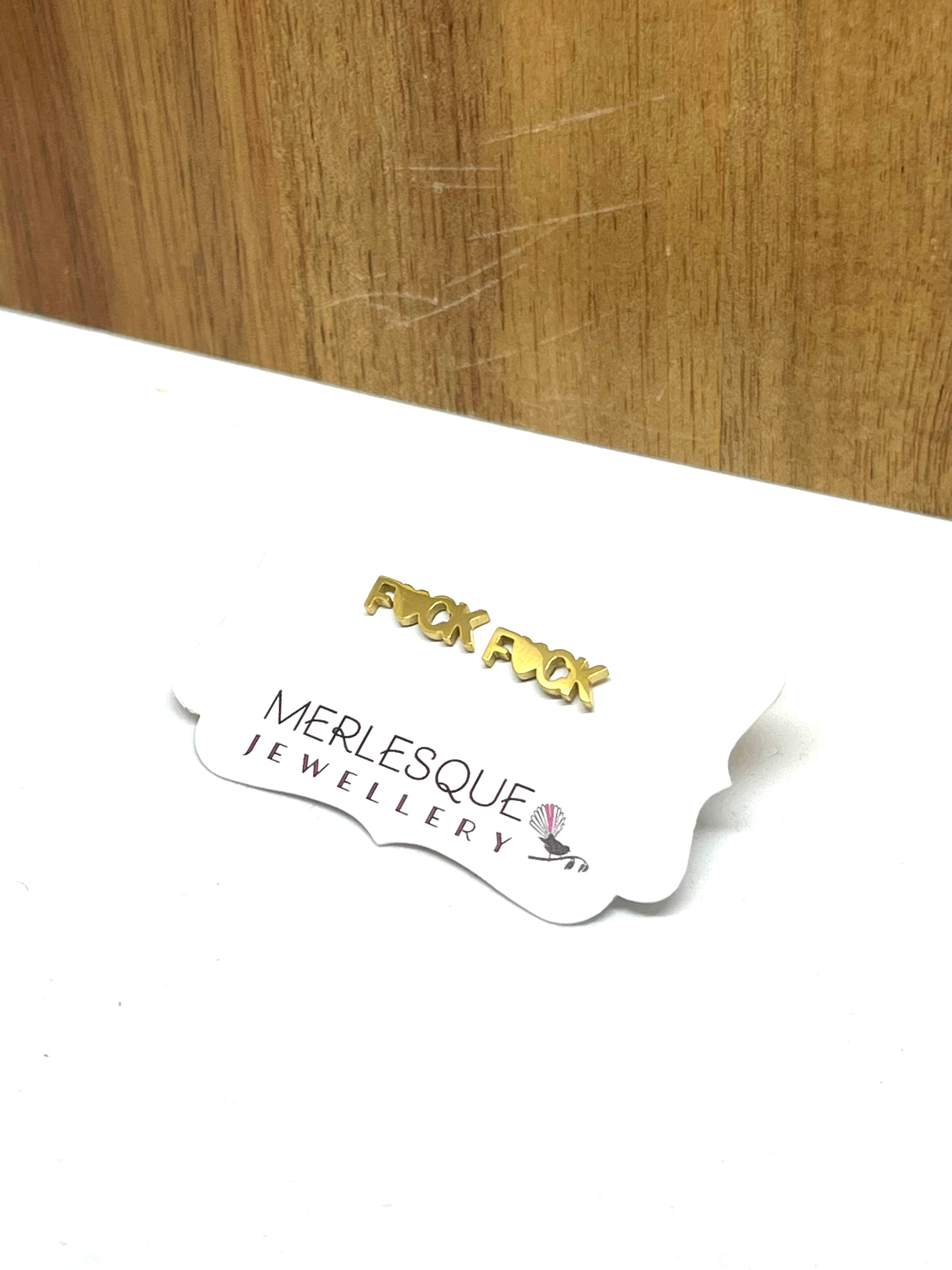 Stainless steel gold fuck studs.