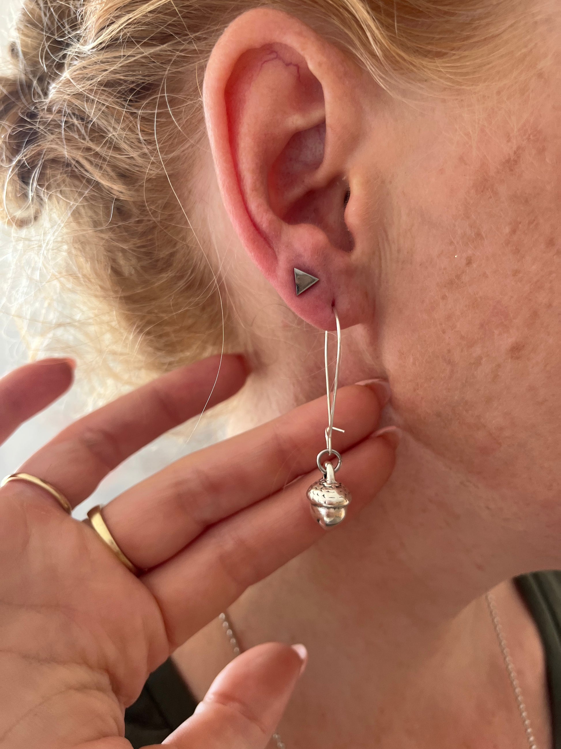 Long silver metal Acorn earrings