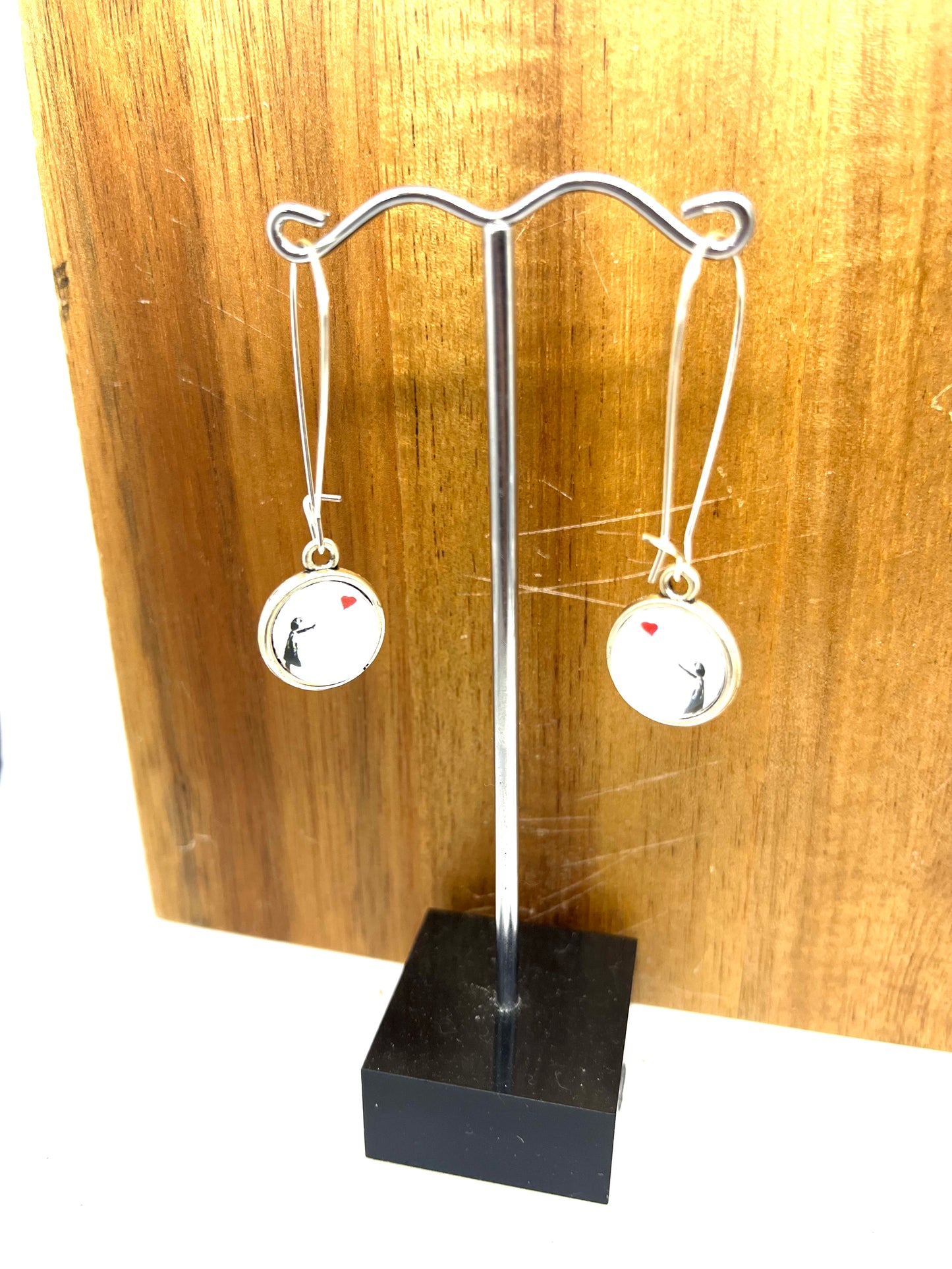 Double sided Banksy glass dome earrings