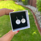 pretty black dragonflies on a pearl background glass dome earrings
