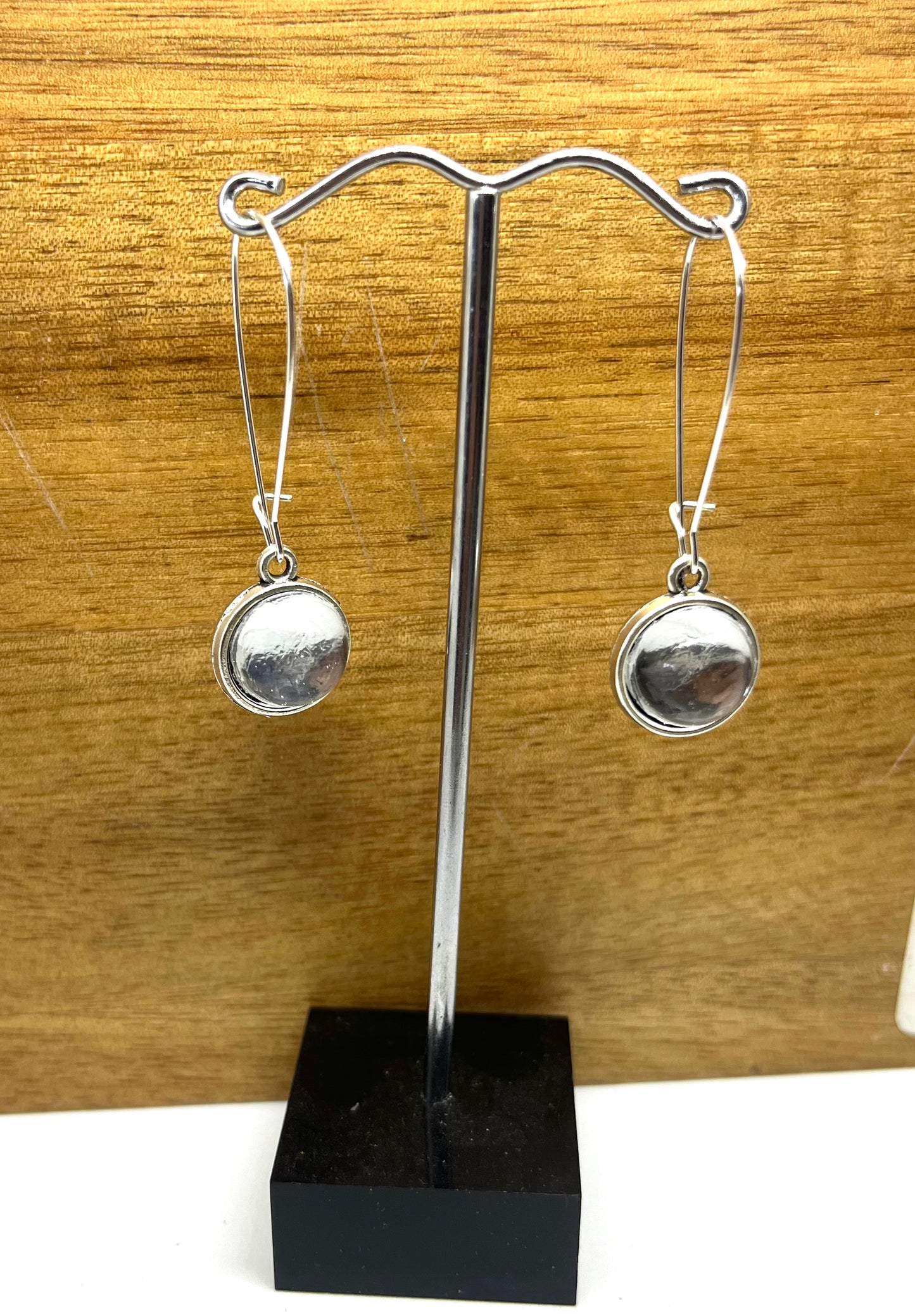 Double sided glass dome earrings with silver metallic